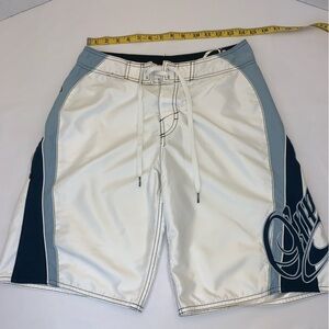 Oneill mens board shorts. White, light and blue stripes. Size:30.